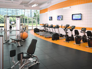 Heartline Fitness Orange Filled Space orange gym facility with cardio machines