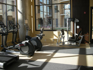 gymnasium with sun casting shadows in the room